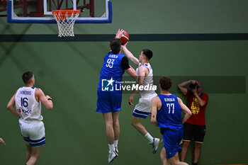 2024-07-06 - Actions of the game and players' images during the between Greece and Slovenija at Pala Cian Toma - Domegge (BL) 6 July, 2024 during the Torneo Under 20 - 22° Memorial De Silvestro/Trofeo Meneghin - TORNEO UNDER 20 - 22° MEMORIAL DE SILVESTRO/TROFEO MENEGHIN - GRECIA VS SLOVENIA - EVENTS - BASKETBALL