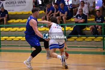 2024-07-06 - Actions of the game and players' images during the between Greece and Slovenija at Pala Cian Toma - Domegge (BL) 6 July, 2024 during the Torneo Under 20 - 22° Memorial De Silvestro/Trofeo Meneghin - TORNEO UNDER 20 - 22° MEMORIAL DE SILVESTRO/TROFEO MENEGHIN - GRECIA VS SLOVENIA - EVENTS - BASKETBALL