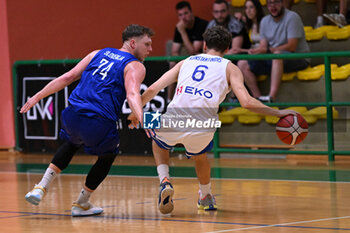 2024-07-06 - Actions of the game and players' images during the between Greece and Slovenija at Pala Cian Toma - Domegge (BL) 6 July, 2024 during the Torneo Under 20 - 22° Memorial De Silvestro/Trofeo Meneghin - TORNEO UNDER 20 - 22° MEMORIAL DE SILVESTRO/TROFEO MENEGHIN - GRECIA VS SLOVENIA - EVENTS - BASKETBALL