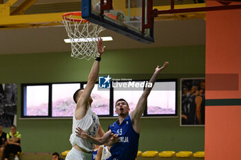 2024-07-06 - Actions of the game and players' images during the between Greece and Slovenija at Pala Cian Toma - Domegge (BL) 6 July, 2024 during the Torneo Under 20 - 22° Memorial De Silvestro/Trofeo Meneghin - TORNEO UNDER 20 - 22° MEMORIAL DE SILVESTRO/TROFEO MENEGHIN - GRECIA VS SLOVENIA - EVENTS - BASKETBALL