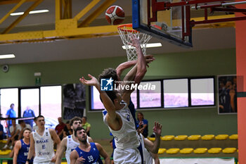 2024-07-06 - Actions of the game and players' images during the between Greece and Slovenija at Pala Cian Toma - Domegge (BL) 6 July, 2024 during the Torneo Under 20 - 22° Memorial De Silvestro/Trofeo Meneghin - TORNEO UNDER 20 - 22° MEMORIAL DE SILVESTRO/TROFEO MENEGHIN - GRECIA VS SLOVENIA - EVENTS - BASKETBALL