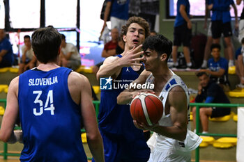 2024-07-06 - Actions of the game and players' images during the between Greece and Slovenija at Pala Cian Toma - Domegge (BL) 6 July, 2024 during the Torneo Under 20 - 22° Memorial De Silvestro/Trofeo Meneghin - TORNEO UNDER 20 - 22° MEMORIAL DE SILVESTRO/TROFEO MENEGHIN - GRECIA VS SLOVENIA - EVENTS - BASKETBALL