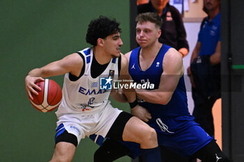 2024-07-06 - Actions of the game and players' images during the between Greece and Slovenija at Pala Cian Toma - Domegge (BL) 6 July, 2024 during the Torneo Under 20 - 22° Memorial De Silvestro/Trofeo Meneghin - TORNEO UNDER 20 - 22° MEMORIAL DE SILVESTRO/TROFEO MENEGHIN - GRECIA VS SLOVENIA - EVENTS - BASKETBALL