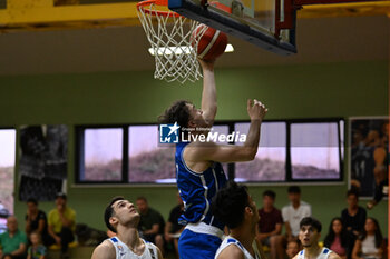 2024-07-07 - Images of the Italy and Greece match at Pala Cian Toma - Domegge (BL) 7 July, 2024, during the 22nd De Silvestro-Meneghin International U20 Basketball Tournament - TORNEO UNDER 20 - 22° MEMORIAL DE SILVESTRO/TROFEO MENEGHIN - ITALIA VS GRECIA - EVENTS - BASKETBALL