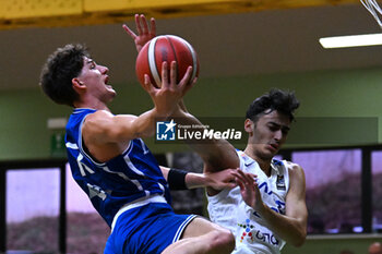 2024-07-07 - Gabriel Pozzato (Italy ) during the match at Pala Cian Toma - Domegge (BL) 7 July, 2024, during the 22nd De Silvestro-Meneghin International U20 Basketball Tournament - TORNEO UNDER 20 - 22° MEMORIAL DE SILVESTRO/TROFEO MENEGHIN - ITALIA VS GRECIA - EVENTS - BASKETBALL