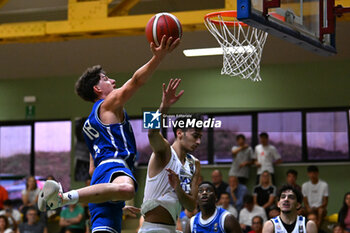 2024-07-07 - Gabriel Pozzato (Italy ) during the match at Pala Cian Toma - Domegge (BL) 7 July, 2024, during the 22nd De Silvestro-Meneghin International U20 Basketball Tournament - TORNEO UNDER 20 - 22° MEMORIAL DE SILVESTRO/TROFEO MENEGHIN - ITALIA VS GRECIA - EVENTS - BASKETBALL