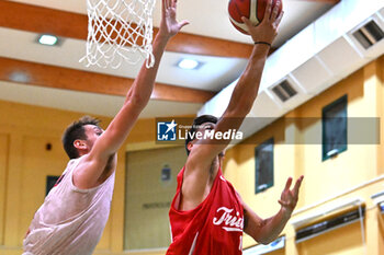 2024-09-07 - Images of the Pallacanestro Trieste and Reyer Venezia match at PalaCornaro - Jesolo (VE), september7, 2024 during the second semifinal of Basketball IN Jesolo 2024 tournament - MEMORIAL BASKETBALL - PALLACANESTRO TRIESTE VS UMANA REYER VENEZIA - EVENTS - BASKETBALL