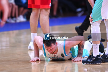 2024-07-02 - 77 Luka Doncic of Slovenia is playing during the FIBA Olympic Qualifying Tournament 2024, match between Slovenia and Croatia at Peace & Friendship Stadium on July 2, 2024, in Piraeus, Greece. - SLOVENIA VS CROATIA - FIBA OLYMPIC QUALIFYING TOURNAMENTS - INTERNATIONALS - BASKETBALL