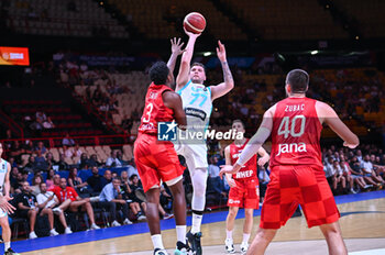 2024-07-02 - 77 Luka Doncic of Slovenia competing with 3 Jaleen Smith of Croatia during the FIBA Olympic Qualifying Tournament 2024, match between Slovenia and Croatia at Peace & Friendship Stadium on July 2, 2024, in Piraeus, Greece. - SLOVENIA VS CROATIA - FIBA OLYMPIC QUALIFYING TOURNAMENTS - INTERNATIONALS - BASKETBALL