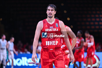 2024-07-02 - 9 Dario Saric of Croatia is playing during the FIBA Olympic Qualifying Tournament 2024, match between Slovenia and Croatia at Peace & Friendship Stadium on July 2, 2024, in Piraeus, Greece. - SLOVENIA VS CROATIA - FIBA OLYMPIC QUALIFYING TOURNAMENTS - INTERNATIONALS - BASKETBALL