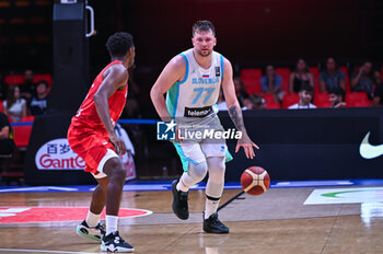 2024-07-02 - 77 Luka Doncic of Slovenia is playing during the FIBA Olympic Qualifying Tournament 2024, match between Slovenia and Croatia at Peace & Friendship Stadium on July 2, 2024, in Piraeus, Greece. - SLOVENIA VS CROATIA - FIBA OLYMPIC QUALIFYING TOURNAMENTS - INTERNATIONALS - BASKETBALL