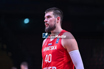 2024-07-02 - 40 Ivica Zubac of Croatia is playing during the FIBA Olympic Qualifying Tournament 2024, match between Slovenia and Croatia at Peace & Friendship Stadium on July 2, 2024, in Piraeus, Greece. - SLOVENIA VS CROATIA - FIBA OLYMPIC QUALIFYING TOURNAMENTS - INTERNATIONALS - BASKETBALL