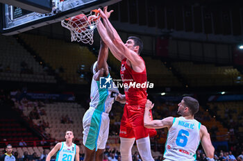 2024-07-02 - 22 Danko Brankovic of Croatia competing with 9 Josh Nebo of Slovenia during the FIBA Olympic Qualifying Tournament 2024, match between Slovenia and Croatia at Peace & Friendship Stadium on July 2, 2024, in Piraeus, Greece. - SLOVENIA VS CROATIA - FIBA OLYMPIC QUALIFYING TOURNAMENTS - INTERNATIONALS - BASKETBALL