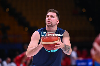 2024-07-02 - 77 Luka Doncic of Slovenia is playing during the FIBA Olympic Qualifying Tournament 2024, match between Slovenia and Croatia at Peace & Friendship Stadium on July 2, 2024, in Piraeus, Greece. - SLOVENIA VS CROATIA - FIBA OLYMPIC QUALIFYING TOURNAMENTS - INTERNATIONALS - BASKETBALL