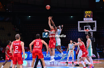 2024-07-02 - 40 Ivica Zubac of Croatia competing with 9 Josh Nebo of Slovenia during the FIBA Olympic Qualifying Tournament 2024, match between Slovenia and Croatia at Peace & Friendship Stadium on July 2, 2024, in Piraeus, Greece. - SLOVENIA VS CROATIA - FIBA OLYMPIC QUALIFYING TOURNAMENTS - INTERNATIONALS - BASKETBALL