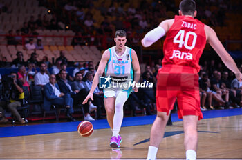 2024-07-02 - 31 Vlatko Cancar of Slovenia is playing during the FIBA Olympic Qualifying Tournament 2024, match between Slovenia and Croatia at Peace & Friendship Stadium on July 2, 2024, in Piraeus, Greece. - SLOVENIA VS CROATIA - FIBA OLYMPIC QUALIFYING TOURNAMENTS - INTERNATIONALS - BASKETBALL