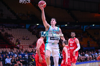 2024-07-02 - 31 Vlatko Cancar of Slovenia is playing during the FIBA Olympic Qualifying Tournament 2024, match between Slovenia and Croatia at Peace & Friendship Stadium on July 2, 2024, in Piraeus, Greece. - SLOVENIA VS CROATIA - FIBA OLYMPIC QUALIFYING TOURNAMENTS - INTERNATIONALS - BASKETBALL