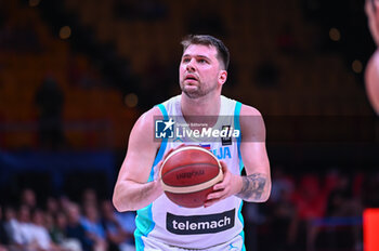 2024-07-02 - 77 Luka Doncic of Slovenia is playing during the FIBA Olympic Qualifying Tournament 2024, match between Slovenia and Croatia at Peace & Friendship Stadium on July 2, 2024, in Piraeus, Greece. - SLOVENIA VS CROATIA - FIBA OLYMPIC QUALIFYING TOURNAMENTS - INTERNATIONALS - BASKETBALL