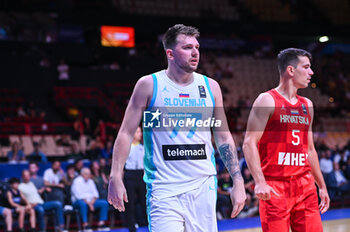 2024-07-02 - 77 Luka Doncic of Slovenia is playing during the FIBA Olympic Qualifying Tournament 2024, match between Slovenia and Croatia at Peace & Friendship Stadium on July 2, 2024, in Piraeus, Greece. - SLOVENIA VS CROATIA - FIBA OLYMPIC QUALIFYING TOURNAMENTS - INTERNATIONALS - BASKETBALL