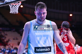 2024-07-02 - 77 Luka Doncic of Slovenia is playing during the FIBA Olympic Qualifying Tournament 2024, match between Slovenia and Croatia at Peace & Friendship Stadium on July 2, 2024, in Piraeus, Greece. - SLOVENIA VS CROATIA - FIBA OLYMPIC QUALIFYING TOURNAMENTS - INTERNATIONALS - BASKETBALL