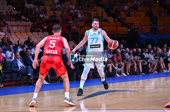 2024-07-02 - 77 Luka Doncic of Slovenia is playing during the FIBA Olympic Qualifying Tournament 2024, match between Slovenia and Croatia at Peace & Friendship Stadium on July 2, 2024, in Piraeus, Greece. - SLOVENIA VS CROATIA - FIBA OLYMPIC QUALIFYING TOURNAMENTS - INTERNATIONALS - BASKETBALL