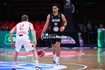 2024-07-03 - 51 Shea Ili of New Zealand is playing during the FIBA Olympic Qualifying Tournament 2024, match between Croatia and New Zealand at Peace & Friendship Stadium on July 3, 2024, in Piraeus, Greece. - CROATIA VS NEW ZEALAND - FIBA OLYMPIC QUALIFYING TOURNAMENTS - INTERNATIONALS - BASKETBALL