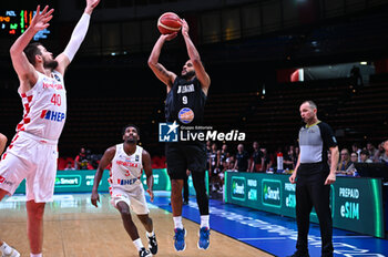 2024-07-03 - 9 Corey Webster of New Zealand is playing during the FIBA Olympic Qualifying Tournament 2024, match between Croatia and New Zealand at Peace & Friendship Stadium on July 3, 2024, in Piraeus, Greece. - CROATIA VS NEW ZEALAND - FIBA OLYMPIC QUALIFYING TOURNAMENTS - INTERNATIONALS - BASKETBALL