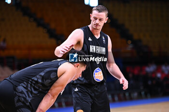 2024-07-03 - 1 Reuben Te Rangi with 3 Finn Delany of New Zealand are playing during the FIBA Olympic Qualifying Tournament 2024, match between Croatia and New Zealand at Peace & Friendship Stadium on July 3, 2024, in Piraeus, Greece. - CROATIA VS NEW ZEALAND - FIBA OLYMPIC QUALIFYING TOURNAMENTS - INTERNATIONALS - BASKETBALL