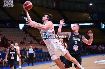 2024-07-03 - 9 Dario Saric of Croatia is playing during the FIBA Olympic Qualifying Tournament 2024, match between Croatia and New Zealand at Peace & Friendship Stadium on July 3, 2024, in Piraeus, Greece. - CROATIA VS NEW ZEALAND - FIBA OLYMPIC QUALIFYING TOURNAMENTS - INTERNATIONALS - BASKETBALL