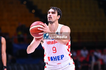 2024-07-03 - 9 Dario Saric of Croatia is playing during the FIBA Olympic Qualifying Tournament 2024, match between Croatia and New Zealand at Peace & Friendship Stadium on July 3, 2024, in Piraeus, Greece. - CROATIA VS NEW ZEALAND - FIBA OLYMPIC QUALIFYING TOURNAMENTS - INTERNATIONALS - BASKETBALL