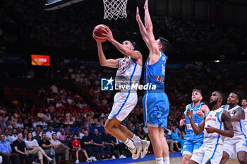 2024-07-03 - 27 Christopher Theoret Duarte of Dominican Republic competing with 16 Kostas Papanikolaou of Greece during the FIBA Olympic Qualifying Tournament 2024, match between Dominican Republic and Greece at Peace & Friendship Stadium on July 3, 2024, in Piraeus, Greece. - DOMINICAN REPUBLIC VS GREECE - FIBA OLYMPIC QUALIFYING TOURNAMENTS - INTERNATIONALS - BASKETBALL