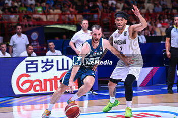 2024-07-04 - 37 leon Stergar of Slovenia competing with 2 Izayah Le’Afa of New Zealand during the FIBA Olympic Qualifying Tournament 2024, match between Slovenia and New Zealand at Peace & Friendship Stadium on July 4, 2024, in Piraeus, Greece. - NEW ZEALAND VS SLOVENIA - FIBA OLYMPIC QUALIFYING TOURNAMENTS - INTERNATIONALS - BASKETBALL