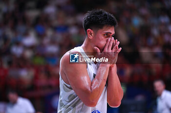 2024-07-04 - 1 Reuben Te Rangi of New Zealand is playing during the FIBA Olympic Qualifying Tournament 2024, match between Slovenia and New Zealand at Peace & Friendship Stadium on July 4, 2024, in Piraeus, Greece. - NEW ZEALAND VS SLOVENIA - FIBA OLYMPIC QUALIFYING TOURNAMENTS - INTERNATIONALS - BASKETBALL