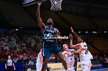 2024-07-04 - 9 Josh Nebo of Slovenia is playing during the FIBA Olympic Qualifying Tournament 2024, match between Slovenia and New Zealand at Peace & Friendship Stadium on July 4, 2024, in Piraeus, Greece. - NEW ZEALAND VS SLOVENIA - FIBA OLYMPIC QUALIFYING TOURNAMENTS - INTERNATIONALS - BASKETBALL