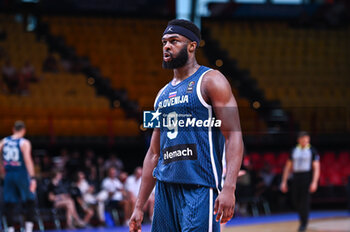 2024-07-04 - 9 Josh Nebo of Slovenia is playing during the FIBA Olympic Qualifying Tournament 2024, match between Slovenia and New Zealand at Peace & Friendship Stadium on July 4, 2024, in Piraeus, Greece. - NEW ZEALAND VS SLOVENIA - FIBA OLYMPIC QUALIFYING TOURNAMENTS - INTERNATIONALS - BASKETBALL