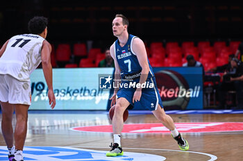 2024-07-04 - 7 Klemen Prepelic of Slovenia is playing during the FIBA Olympic Qualifying Tournament 2024, match between Slovenia and New Zealand at Peace & Friendship Stadium on July 4, 2024, in Piraeus, Greece. - NEW ZEALAND VS SLOVENIA - FIBA OLYMPIC QUALIFYING TOURNAMENTS - INTERNATIONALS - BASKETBALL