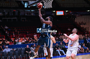 2024-07-04 - 9 Josh Nebo of Slovenia is playing during the FIBA Olympic Qualifying Tournament 2024, match between Slovenia and New Zealand at Peace & Friendship Stadium on July 4, 2024, in Piraeus, Greece. - NEW ZEALAND VS SLOVENIA - FIBA OLYMPIC QUALIFYING TOURNAMENTS - INTERNATIONALS - BASKETBALL