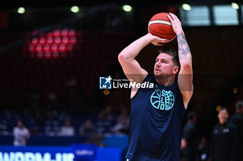 2024-07-04 - 77 Luka Doncic of Slovenia is playing during the FIBA Olympic Qualifying Tournament 2024, match between Slovenia and New Zealand at Peace & Friendship Stadium on July 4, 2024, in Piraeus, Greece. - NEW ZEALAND VS SLOVENIA - FIBA OLYMPIC QUALIFYING TOURNAMENTS - INTERNATIONALS - BASKETBALL