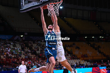 2024-07-04 - 37 leon Stergar of Slovenia is playing during the FIBA Olympic Qualifying Tournament 2024, match between Slovenia and New Zealand at Peace & Friendship Stadium on July 4, 2024, in Piraeus, Greece. - NEW ZEALAND VS SLOVENIA - FIBA OLYMPIC QUALIFYING TOURNAMENTS - INTERNATIONALS - BASKETBALL