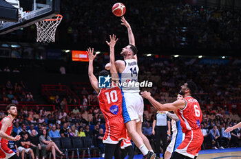 2024-07-04 - 14 Georgios Papagiannis of Greece is playing during the FIBA Olympic Qualifying Tournament 2024, match between Egypt and Greece at Peace & Friendship Stadium on July 4, 2024, in Piraeus, Greece. - GREECE VS EGYPT - FIBA OLYMPIC QUALIFYING TOURNAMENTS - INTERNATIONALS - BASKETBALL