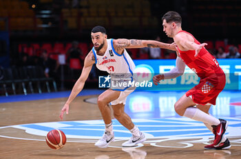 2024-07-06 - 27 Christopher Theoret Duarte of Dominican Republic competing with 8 Mario Hezonja of Croatia during the FIBA Olympic Qualifying Tournament 2024 Semi Final match between Dominican Republic and Croatia at Peace & Friendship Stadium on July 6, 2024, in Piraeus, Greece. - DOMINICAN REPUBLIC VS CROATIA - SEMI FINALS, FIBA OLYMPIC QUALIFYING TOURNAMENTS - INTERNATIONALS - BASKETBALL