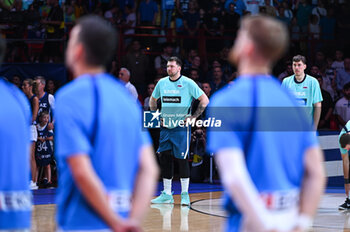 2024-07-06 - 77 Luka Doncic of Slovenia is playing during the FIBA Olympic Qualifying Tournament 2024 Semi Final match between Greece and Slovenia at Peace & Friendship Stadium on July 6, 2024, in Piraeus, Greece. - GREECE VS SLOVENIA - SEMI FINALS, FIBA OLYMPIC QUALIFYING TOURNAMENTS - INTERNATIONALS - BASKETBALL