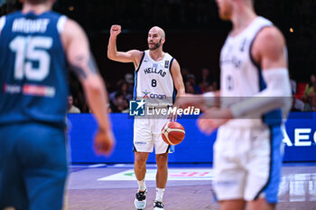 2024-07-06 - 8 Nick Calathes of Greece is playing during the FIBA Olympic Qualifying Tournament 2024 Semi Final match between Greece and Slovenia at Peace & Friendship Stadium on July 6, 2024, in Piraeus, Greece. - GREECE VS SLOVENIA - SEMI FINALS, FIBA OLYMPIC QUALIFYING TOURNAMENTS - INTERNATIONALS - BASKETBALL