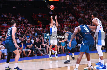 2024-07-06 - 8 Nick Calathes of Greece is playing during the FIBA Olympic Qualifying Tournament 2024 Semi Final match between Greece and Slovenia at Peace & Friendship Stadium on July 6, 2024, in Piraeus, Greece. - GREECE VS SLOVENIA - SEMI FINALS, FIBA OLYMPIC QUALIFYING TOURNAMENTS - INTERNATIONALS - BASKETBALL