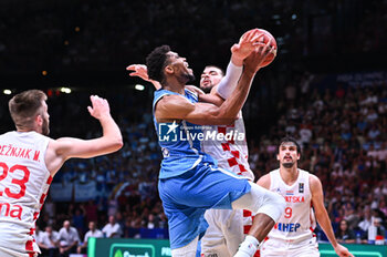 2024-07-07 - 34 Giannis Antetokounmpo of Greece competing with 40 Ivica Zubac of Croatia during the FIBA Olympic Qualifying Tournament 2024 Final match between Croatia and Greece at Peace & Friendship Stadium on July 7, 2024, in Piraeus, Greece. - CROATIA VS GREECE - FINAL, FIBA OLYMPIC QUALIFYING TOURNAMENTS - INTERNATIONALS - BASKETBALL