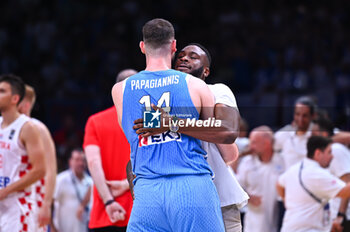 2024-07-07 - 14 Georgios Papagiannis of Greece with Thanassis Antetokounmpo during the FIBA Olympic Qualifying Tournament 2024 Final match between Croatia and Greece at Peace & Friendship Stadium on July 7, 2024, in Piraeus, Greece. - CROATIA VS GREECE - FINAL, FIBA OLYMPIC QUALIFYING TOURNAMENTS - INTERNATIONALS - BASKETBALL