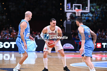 2024-07-07 - 8 Mario Hezonja of Croatia competing with 8 Nick Calathes and 16 Kostas Papanikolaou of Greece during the FIBA Olympic Qualifying Tournament 2024 Final match between Croatia and Greece at Peace & Friendship Stadium on July 7, 2024, in Piraeus, Greece. - CROATIA VS GREECE - FINAL, FIBA OLYMPIC QUALIFYING TOURNAMENTS - INTERNATIONALS - BASKETBALL