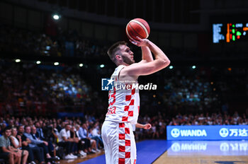 2024-07-07 - 23 Mateo Dreznjak of Croatia is playnig during the FIBA Olympic Qualifying Tournament 2024 Final match between Croatia and Greece at Peace & Friendship Stadium on July 7, 2024, in Piraeus, Greece. - CROATIA VS GREECE - FINAL, FIBA OLYMPIC QUALIFYING TOURNAMENTS - INTERNATIONALS - BASKETBALL