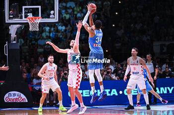 2024-07-07 - 34 Giannis Antetokounmpo of Greece competing with 40 Ivica Zubac of Croatia during the FIBA Olympic Qualifying Tournament 2024 Final match between Croatia and Greece at Peace & Friendship Stadium on July 7, 2024, in Piraeus, Greece. - CROATIA VS GREECE - FINAL, FIBA OLYMPIC QUALIFYING TOURNAMENTS - INTERNATIONALS - BASKETBALL