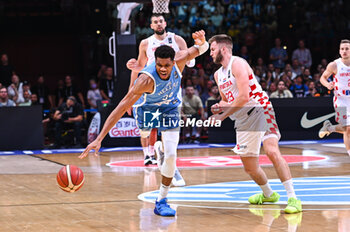 2024-07-07 - 34 Giannis Antetokounmpo of Greece competing with 23 Mateo Dreznjak of Croatia during the FIBA Olympic Qualifying Tournament 2024 Final match between Croatia and Greece at Peace & Friendship Stadium on July 7, 2024, in Piraeus, Greece. - CROATIA VS GREECE - FINAL, FIBA OLYMPIC QUALIFYING TOURNAMENTS - INTERNATIONALS - BASKETBALL